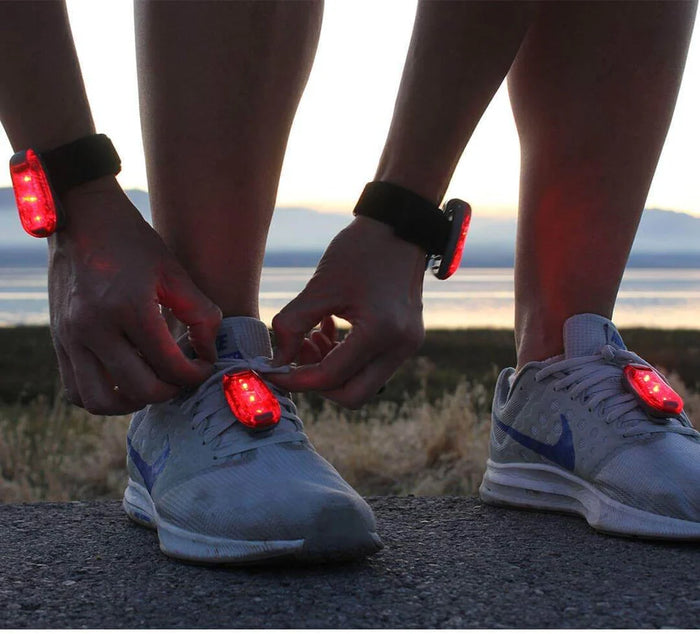 ReflecToes LED clip light worn on the wrist