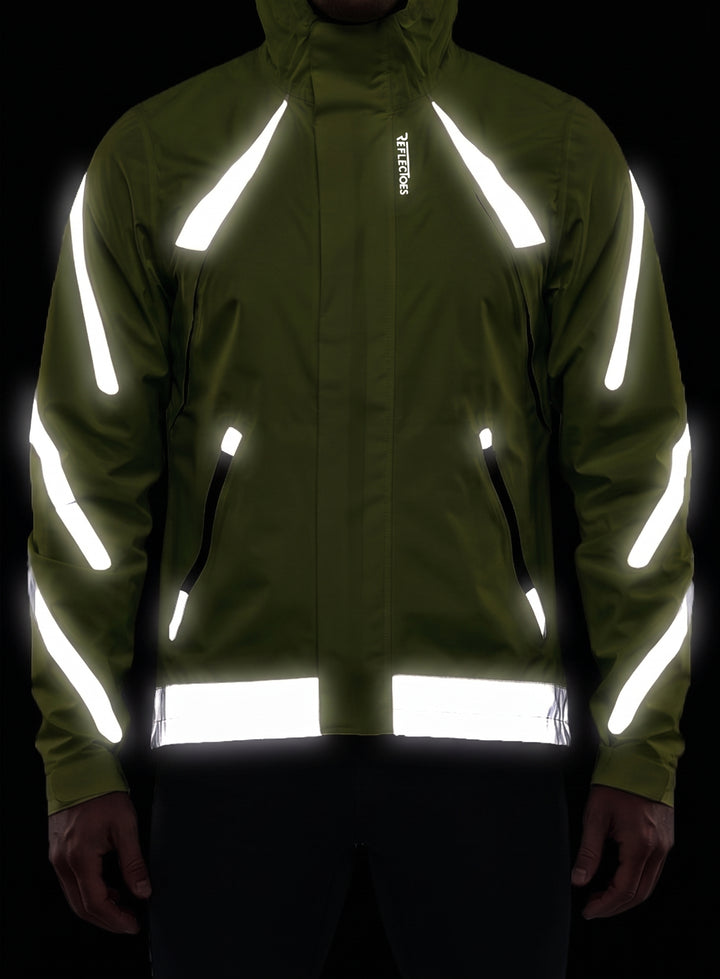 ReflecToes reflective jacket at night with the reflective strips lit up
