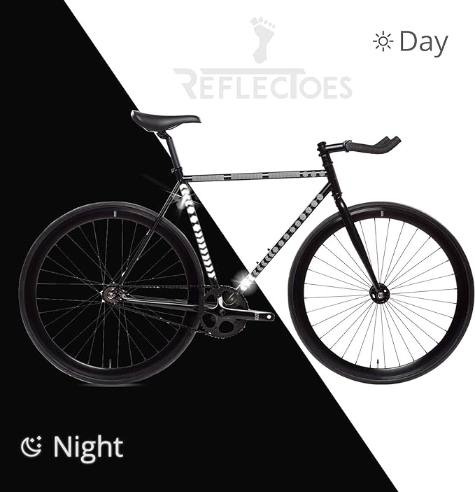 Reflective stickers applied to bike crank pedal axle and helmet shown glowing at night
