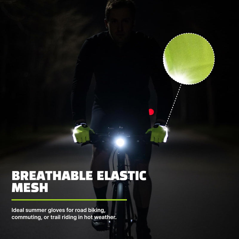 Night cyclist with neon yellow reflective cycling gloves on handlebars showing breathable mesh