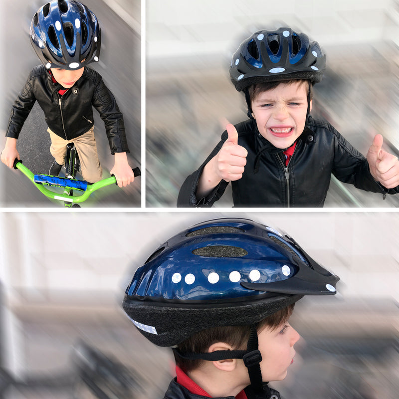 Child wearing safety helmet with reflective stickers on a bike showing decals applied to helmet